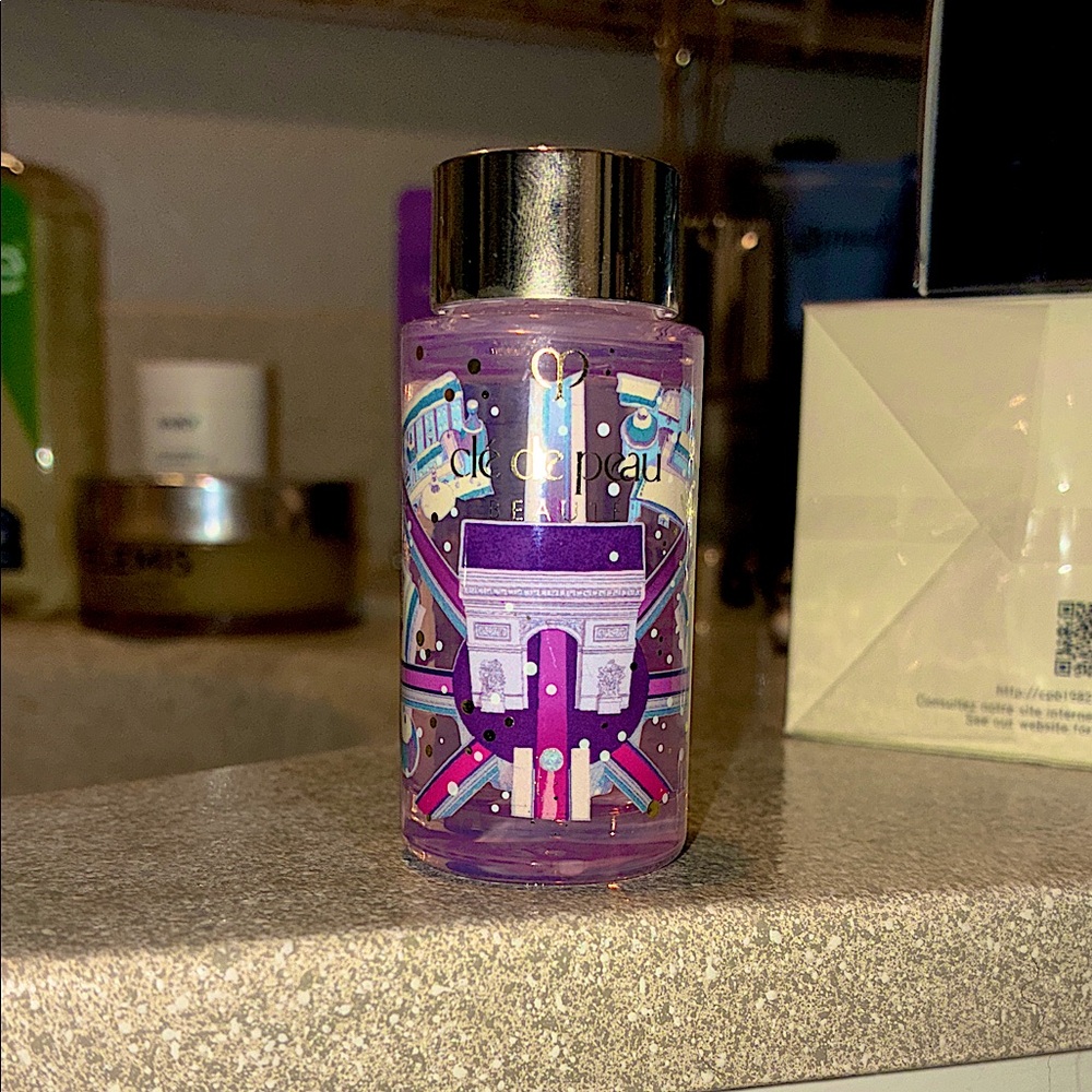 Clé de Peau Beauté Purple Bottle